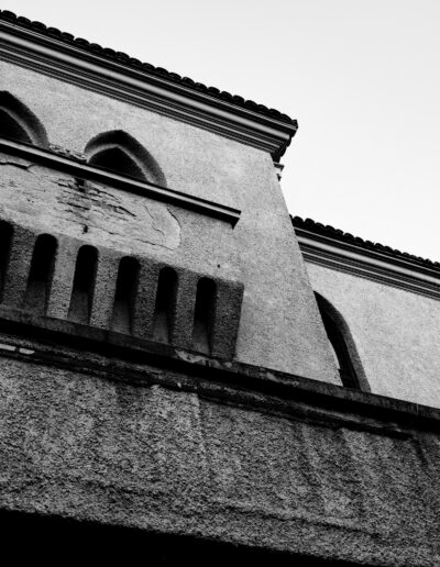 black-and-white architectural photograph highlighting a building's facade in Bucharest Romania