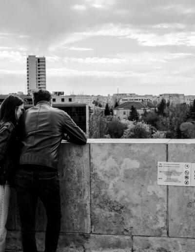 couple overlooking a city skyline in Bucharest Romania