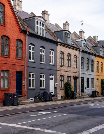 quiet street in the historic city of Copenhagen, Denmark, likely featuring typical 18th or 19th-century architecture found in areas like Østerbro or similar residential districts